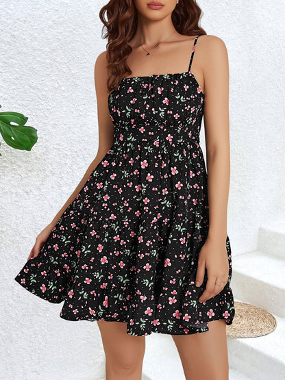 Black - Woman wearing a short floral spaghetti strap tiered sundress