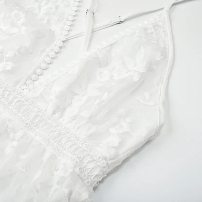 White - White floral appliqué tulle mini dress featuring a deep plunge neckline, crochet-trimmed waist, and a fluid A-line skirt.