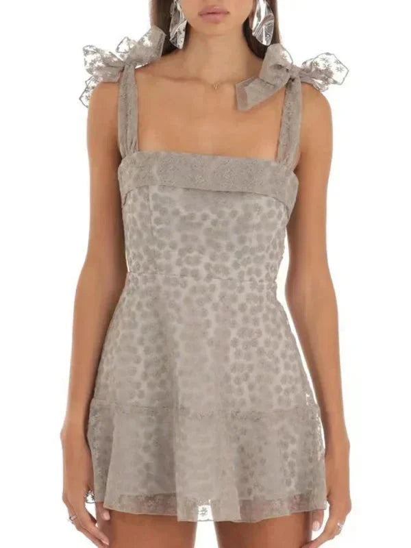 Gray - Pink and white floral tulle mini dress featuring a square neckline, tie-shoulder straps, and a scalloped hem.