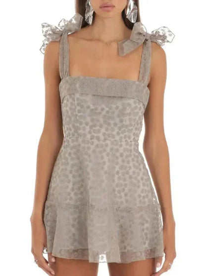 Gray - Pink and white floral tulle mini dress featuring a square neckline, tie-shoulder straps, and a scalloped hem.