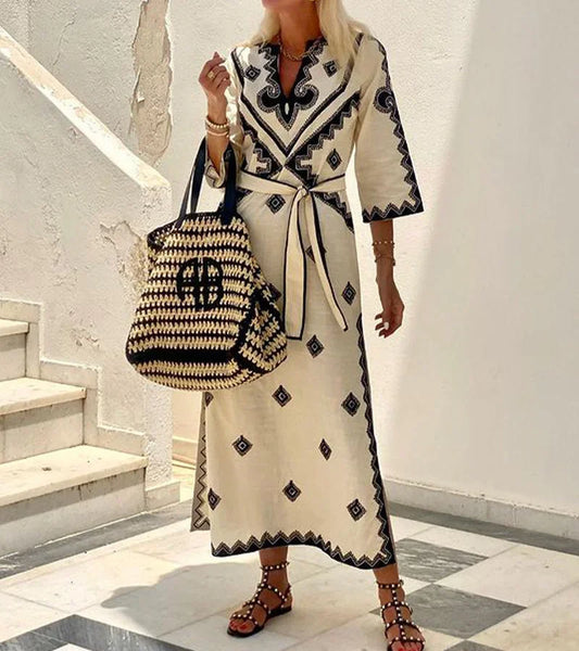 Light brown - Cream and black geometric motif maxi dress featuring a V neckline, three quarter sleeves, and a self tie waist.