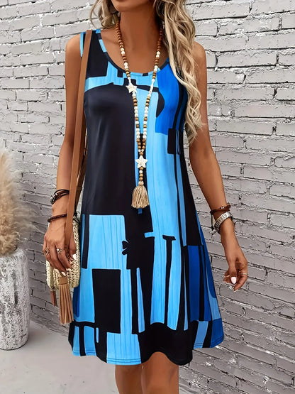 Blue - A woman wearing a sleeveless A-line shift dress featuring a bold black, white, and rust-orange geometric block print, styled with a bohemian wooden bead tassel necklace and a woven shoulder bag.