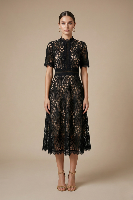 Black - Black geometric guipure lace midi dress featuring a high scalloped neckline, short sleeves, a banded waist, and an A-line skirt over a nude lining.