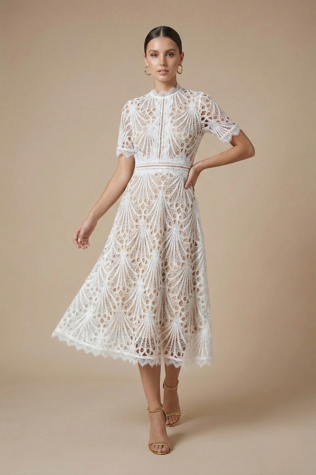 White - Black geometric guipure lace midi dress featuring a high scalloped neckline, short sleeves, a banded waist, and an A-line skirt over a nude lining.