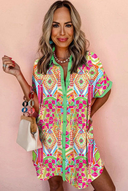 Rainbow - Women's vibrant geometric print mini shirt dress featuring a collared neckline, button-front placket with contrast green trim, and short sleeves.