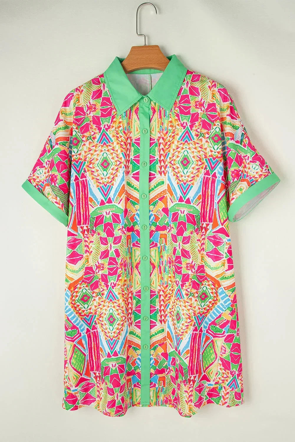 Rainbow - Women's vibrant geometric print mini shirt dress featuring a collared neckline, button-front placket with contrast green trim, and short sleeves.