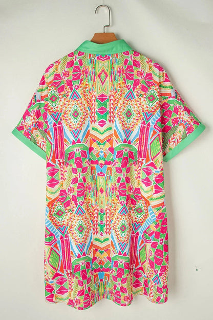 Rainbow - Women's vibrant geometric print mini shirt dress featuring a collared neckline, button-front placket with contrast green trim, and short sleeves.