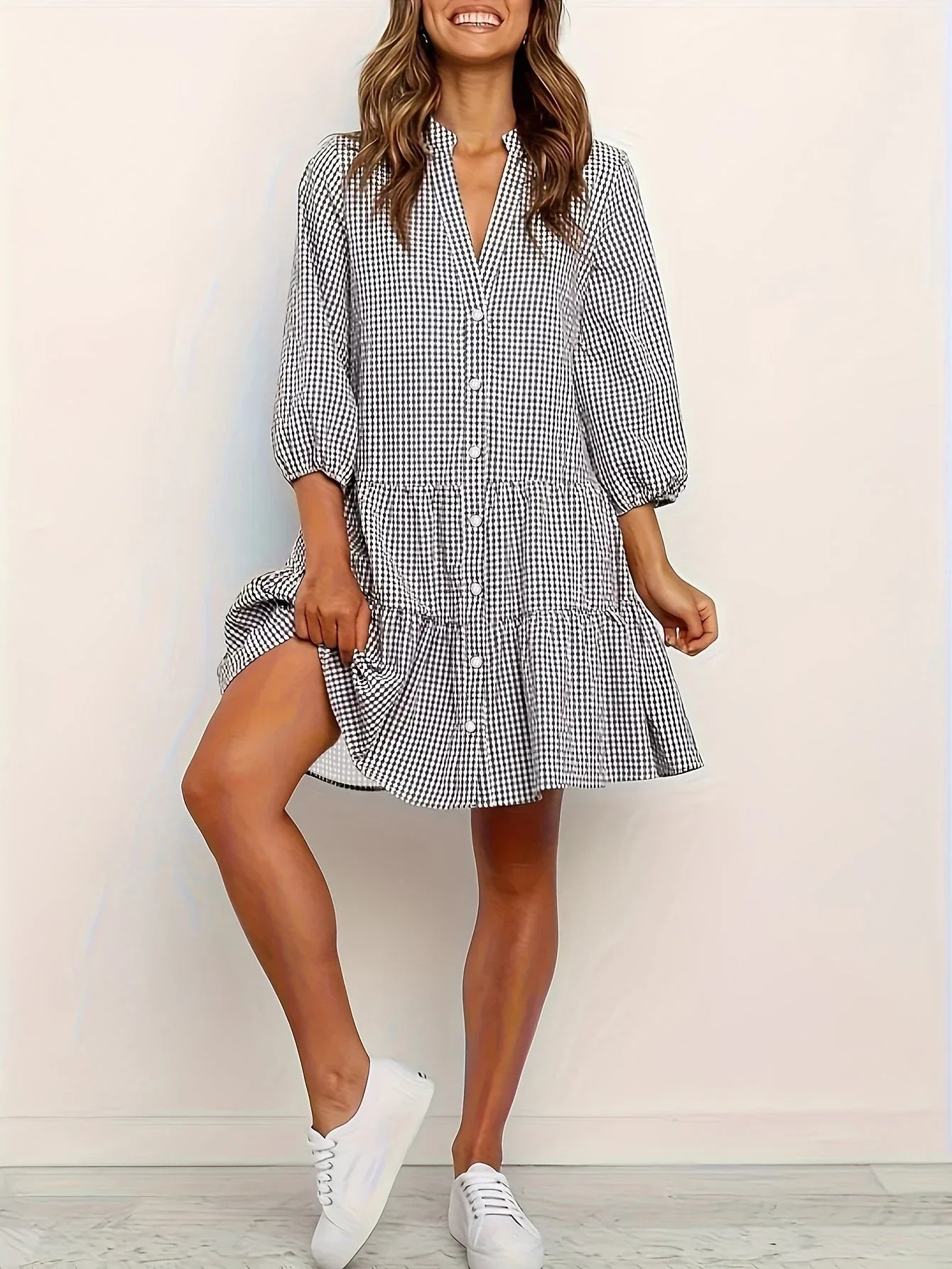 Black - Pink and white gingham tiered mini dress featuring a collared v-neckline, button-front bodice, and three-quarter sleeves.
