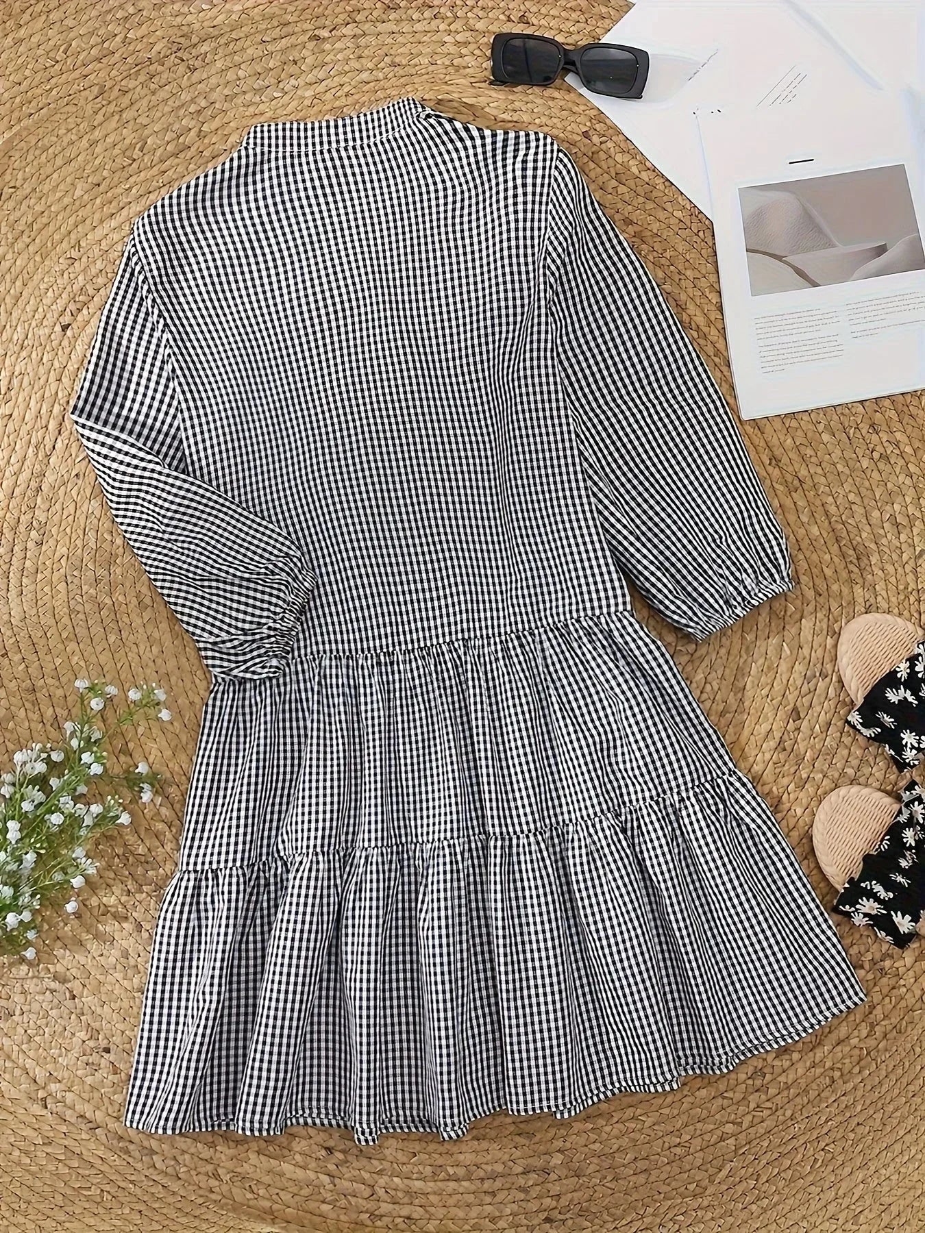 Blue - Pink and white gingham tiered mini dress featuring a collared v-neckline, button-front bodice, and three-quarter sleeves.
