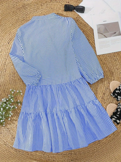 Blue - Pink and white gingham tiered mini dress featuring a collared v-neckline, button-front bodice, and three-quarter sleeves.