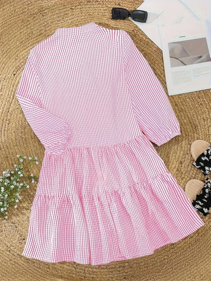 Blue - Pink and white gingham tiered mini dress featuring a collared v-neckline, button-front bodice, and three-quarter sleeves.