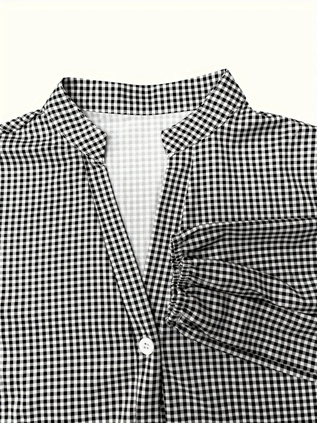 Blue - Pink and white gingham tiered mini dress featuring a collared v-neckline, button-front bodice, and three-quarter sleeves.