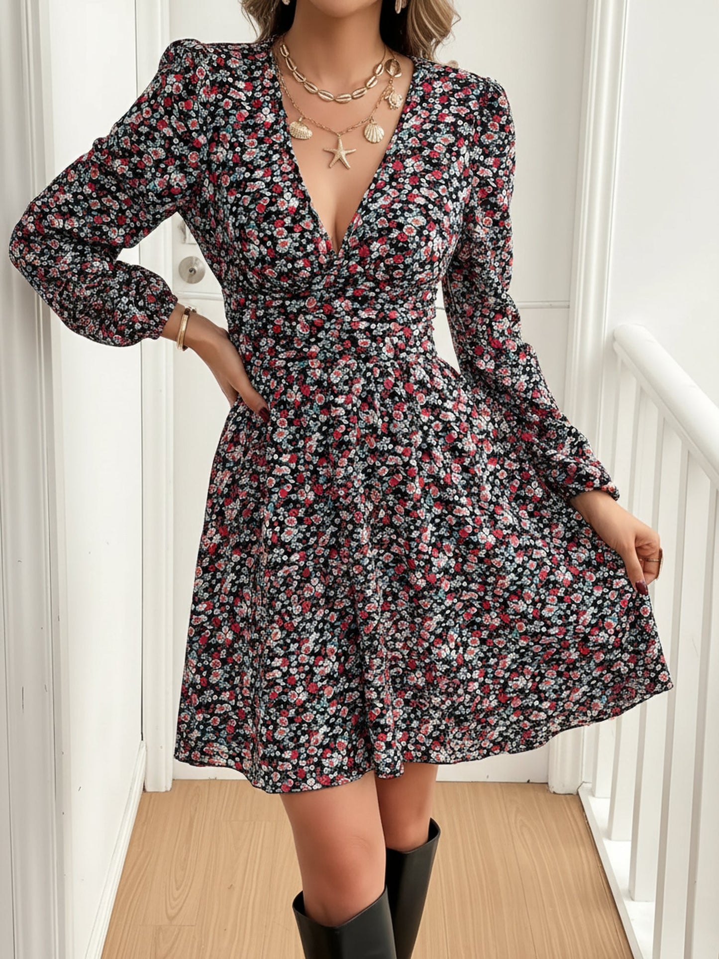 Mixed Colors - Woman wearing a lightweight long sleeve mini dress featuring an abstract leopard print, a v-neckline, and a prominent ruched waist.