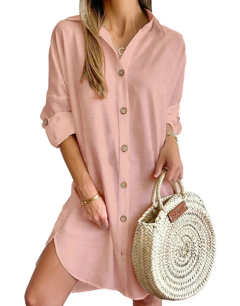 Pink - White linen button-front mini shirt dress featuring a collared neckline, rolled tab sleeves, and a curved hem with side button details.