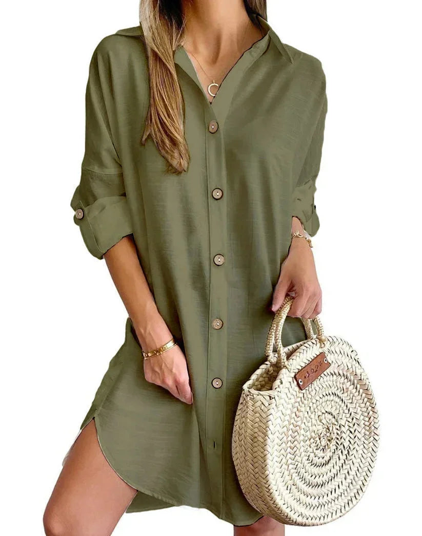 Military green - White linen button-front mini shirt dress featuring a collared neckline, rolled tab sleeves, and a curved hem with side button details.