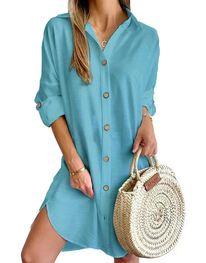 Blue green - White linen button-front mini shirt dress featuring a collared neckline, rolled tab sleeves, and a curved hem with side button details.