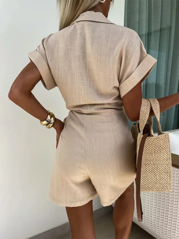 Khaki - Woman wearing a rust-colored linen-blend mini dress with a collar, deep V-neck, and tie waist, styled with sandals and a straw bag.
