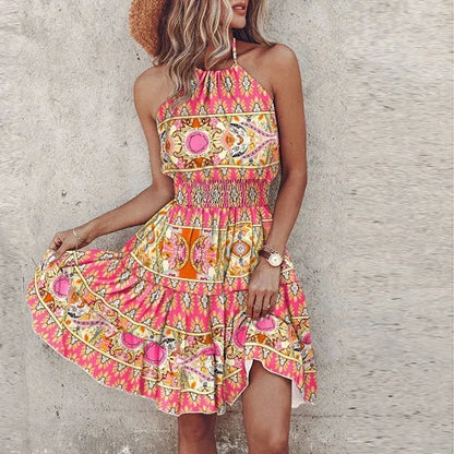 Pink - Women's medallion print mini dress featuring a halter neckline, wide smocked waist, and a fluid tiered skirt.