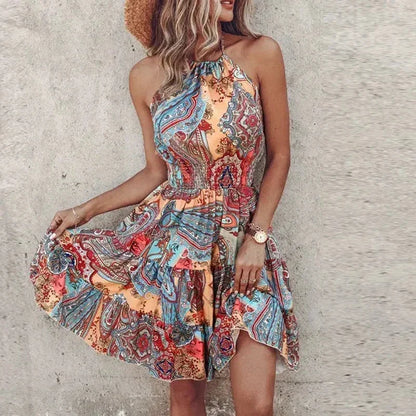 Light blue - Women's medallion print mini dress featuring a halter neckline, wide smocked waist, and a fluid tiered skirt.