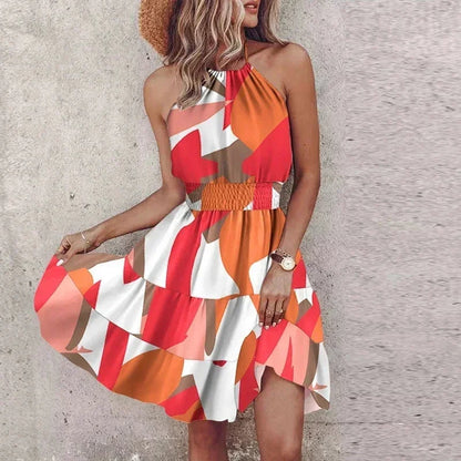 Red - Women's medallion print mini dress featuring a halter neckline, wide smocked waist, and a fluid tiered skirt.
