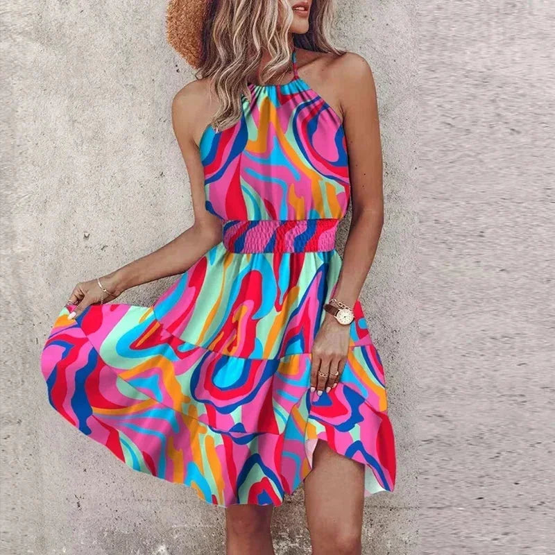 Purple - Women's medallion print mini dress featuring a halter neckline, wide smocked waist, and a fluid tiered skirt.