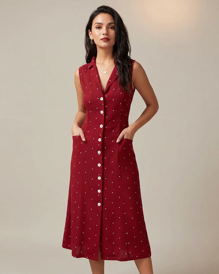 Red - A woman wearing a sleeveless dark red midi dress with white pin dots, featuring a notched collar, button-down front, and side pockets.