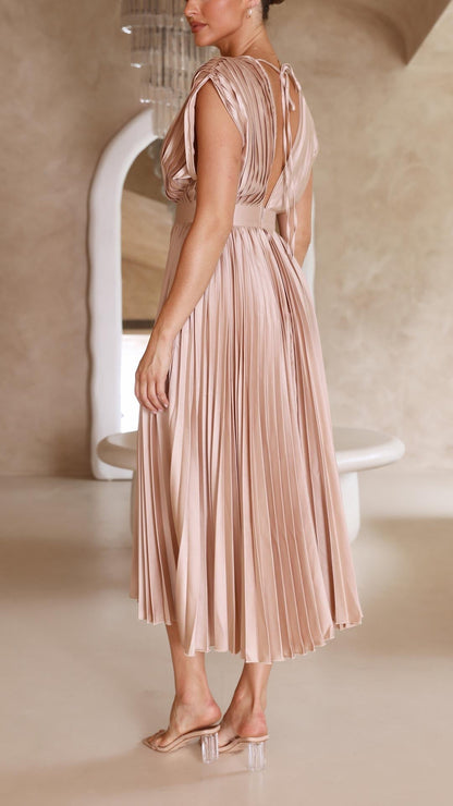 Pink - Champagne pleated midi dress featuring a plunging V-neckline, wide banded waist, and a fluid A-line skirt.