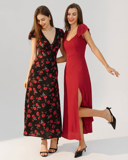 Black - A woman wearing a black midi-length dress with a red rose print, featuring a lace-trimmed V-neckline, cap sleeves, and a fluid A-line skirt.