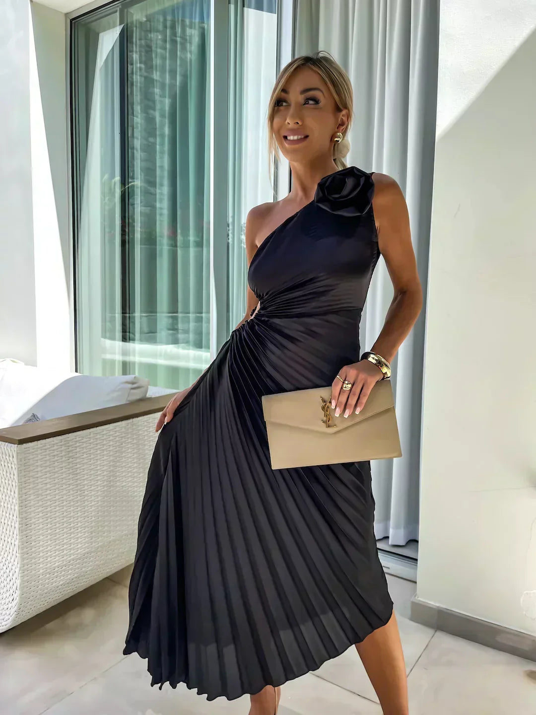 Black - Magenta one-shoulder midi dress featuring a large 3D rosette on the shoulder, ruched bodice with side cutout, and a pleated A-line skirt.