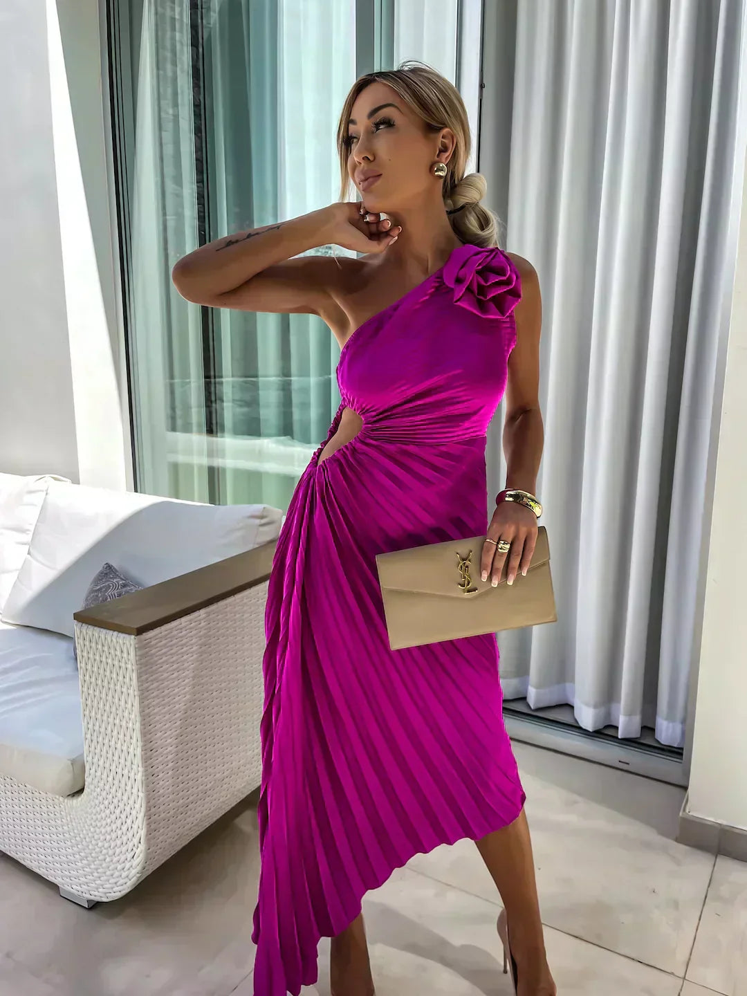 Rose Red - Magenta one-shoulder midi dress featuring a large 3D rosette on the shoulder, ruched bodice with side cutout, and a pleated A-line skirt.