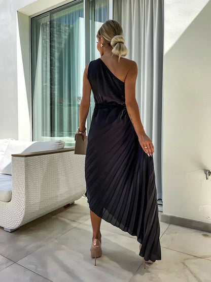 Beige - Magenta one-shoulder midi dress featuring a large 3D rosette on the shoulder, ruched bodice with side cutout, and a pleated A-line skirt.