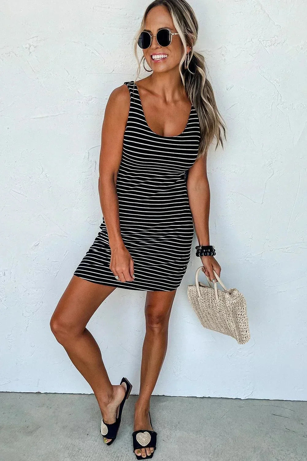Black stripe - Sleeveless fitted tank dress featuring a black and white horizontal stripe pattern and a classic scoop neckline.