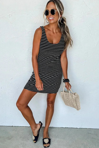 Black stripe - Sleeveless fitted tank dress featuring a black and white horizontal stripe pattern and a classic scoop neckline.