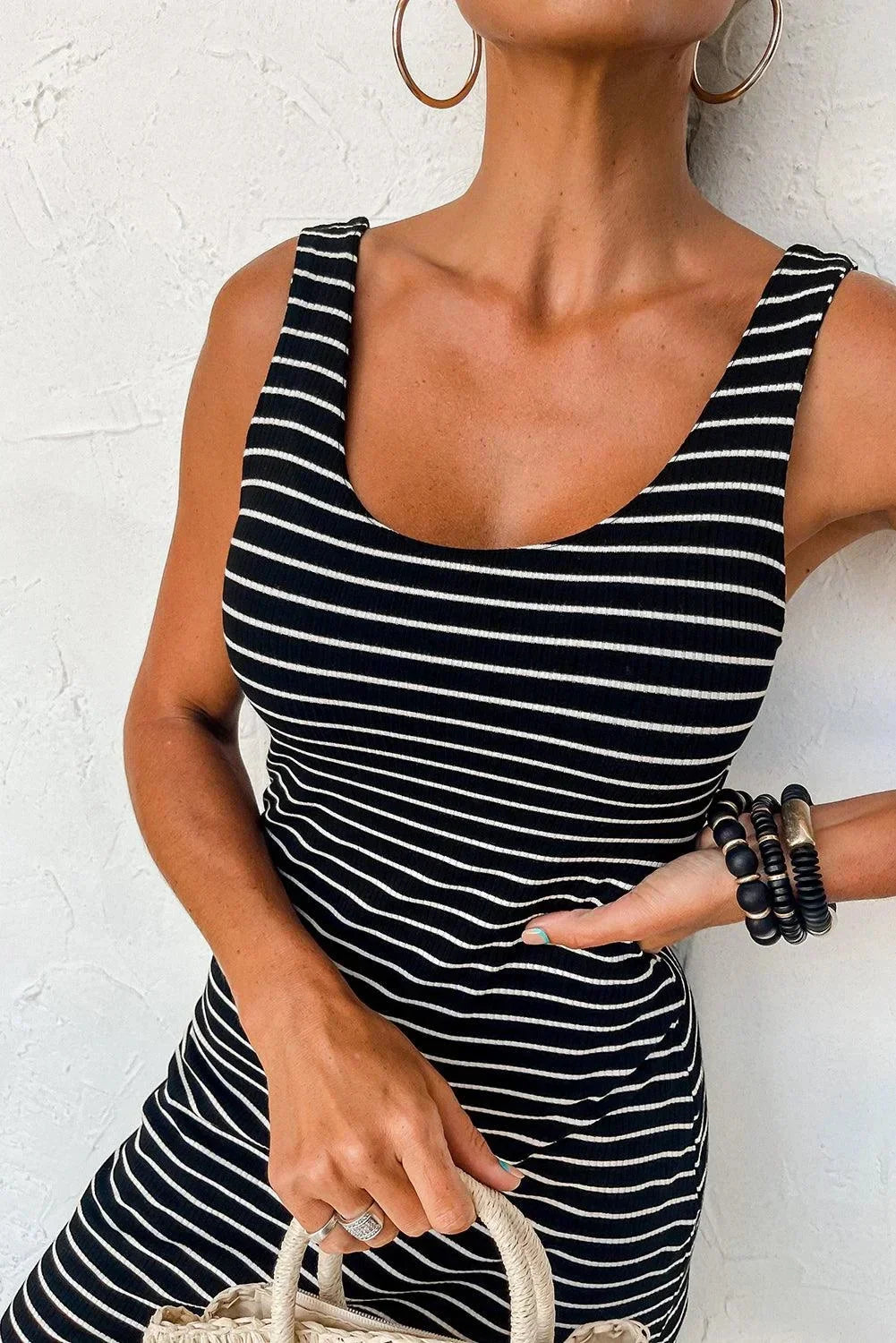 Black stripe - Sleeveless fitted tank dress featuring a black and white horizontal stripe pattern and a classic scoop neckline.
