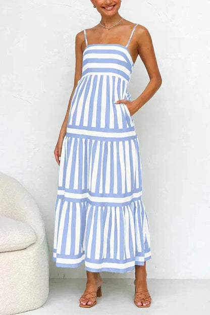 Purple - Women's striped midi dress featuring a square neckline, thin straps, side pockets, and a tiered skirt with contrasting horizontal and vertical stripe placement.