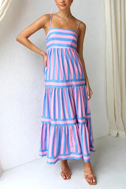 Blue - Women's striped midi dress featuring a square neckline, thin straps, side pockets, and a tiered skirt with contrasting horizontal and vertical stripe placement.