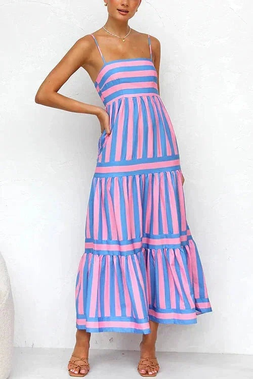 Blue - Women's striped midi dress featuring a square neckline, thin straps, side pockets, and a tiered skirt with contrasting horizontal and vertical stripe placement.