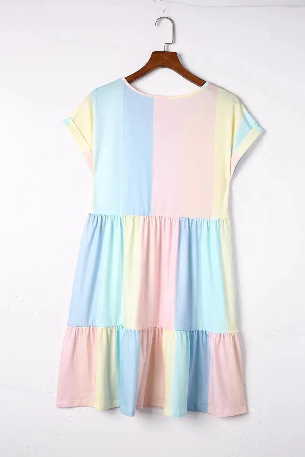 Pastel light - Women's pastel colorblock striped mini dress featuring a V-neckline, short rolled sleeves, and a gathered tiered hem.