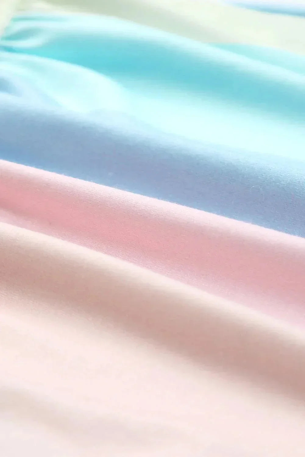 Pastel light - Women's pastel colorblock striped mini dress featuring a V-neckline, short rolled sleeves, and a gathered tiered hem.